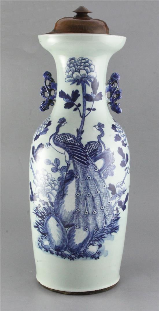 A large Chinese blue and white celadon ground peacock vase, late 19th / early 20th century, height 59cm, wood stand and cover